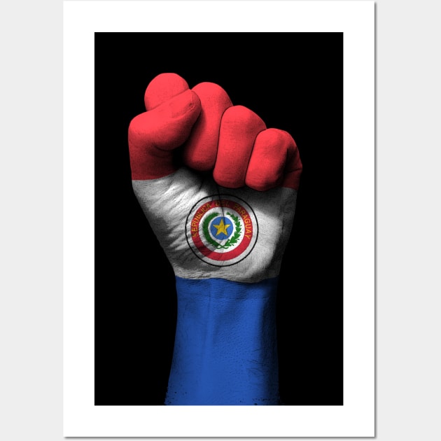 Flag of Paraguay on a Raised Clenched Fist Wall Art by jeffbartels